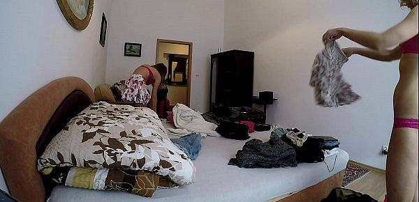 Changing room voyeur video with slim brunette girl