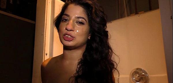 Nadia Ali having fun with black cock in a gloryhole